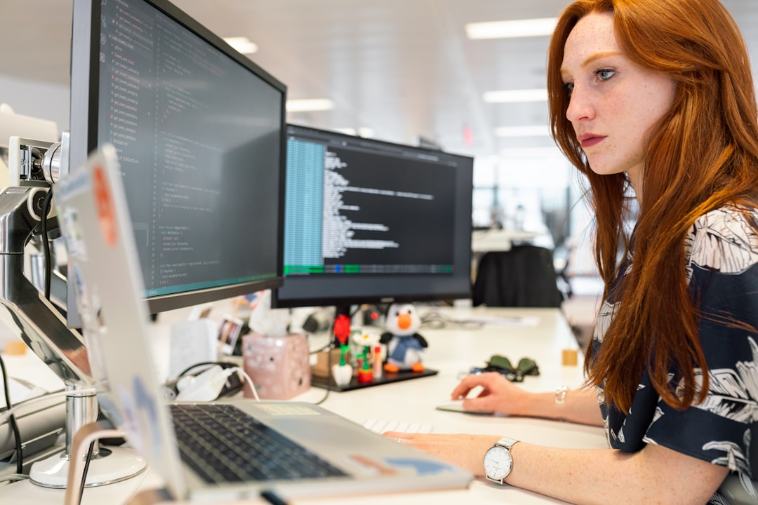 woman working at computer as content creator