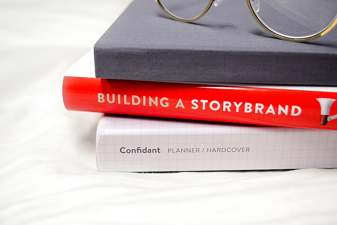 gold framed eyeglasses on marketing book for learning