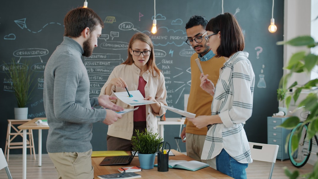 Diverse team collaborating on a project in an office