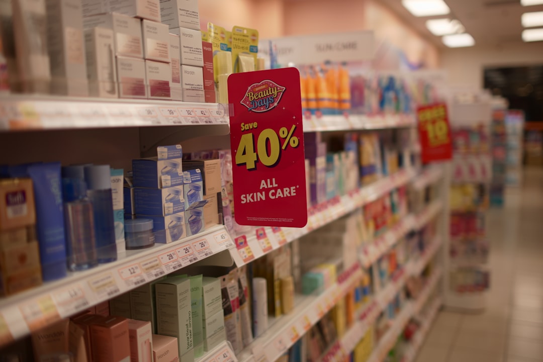 Skincare products on shelves with a 40% off sale sign